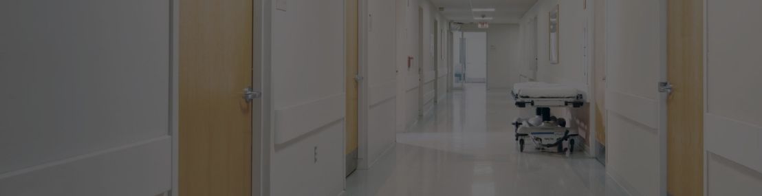 Hospital bed in hallway